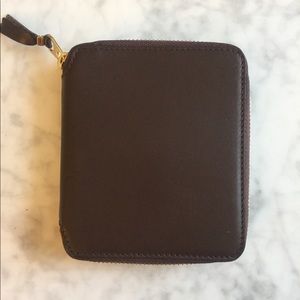 COMME DES GARÇONS WALLET 
zip around wallet brown